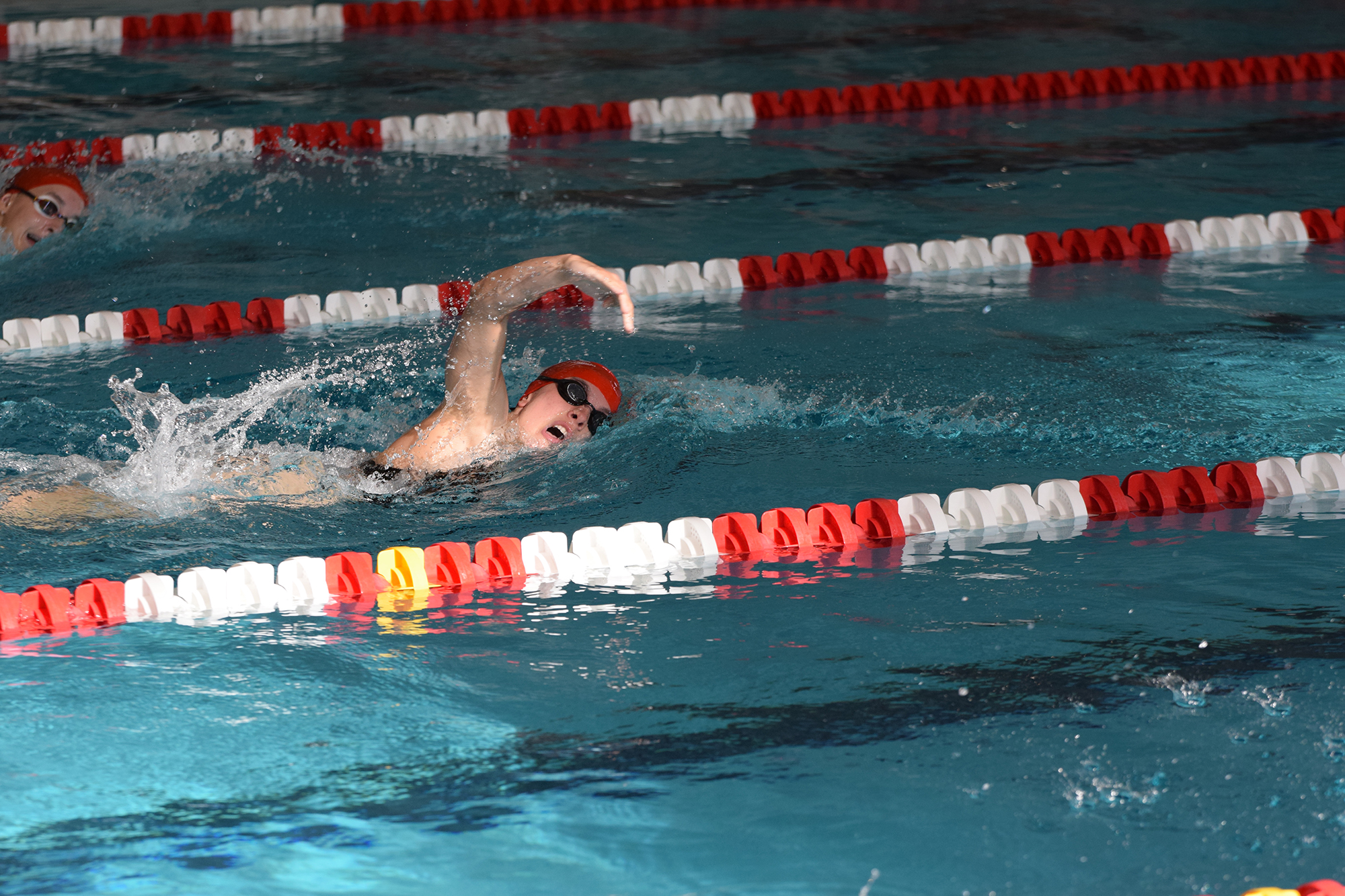 Ruby Redlich competes as part of the CMU varsity swim team
